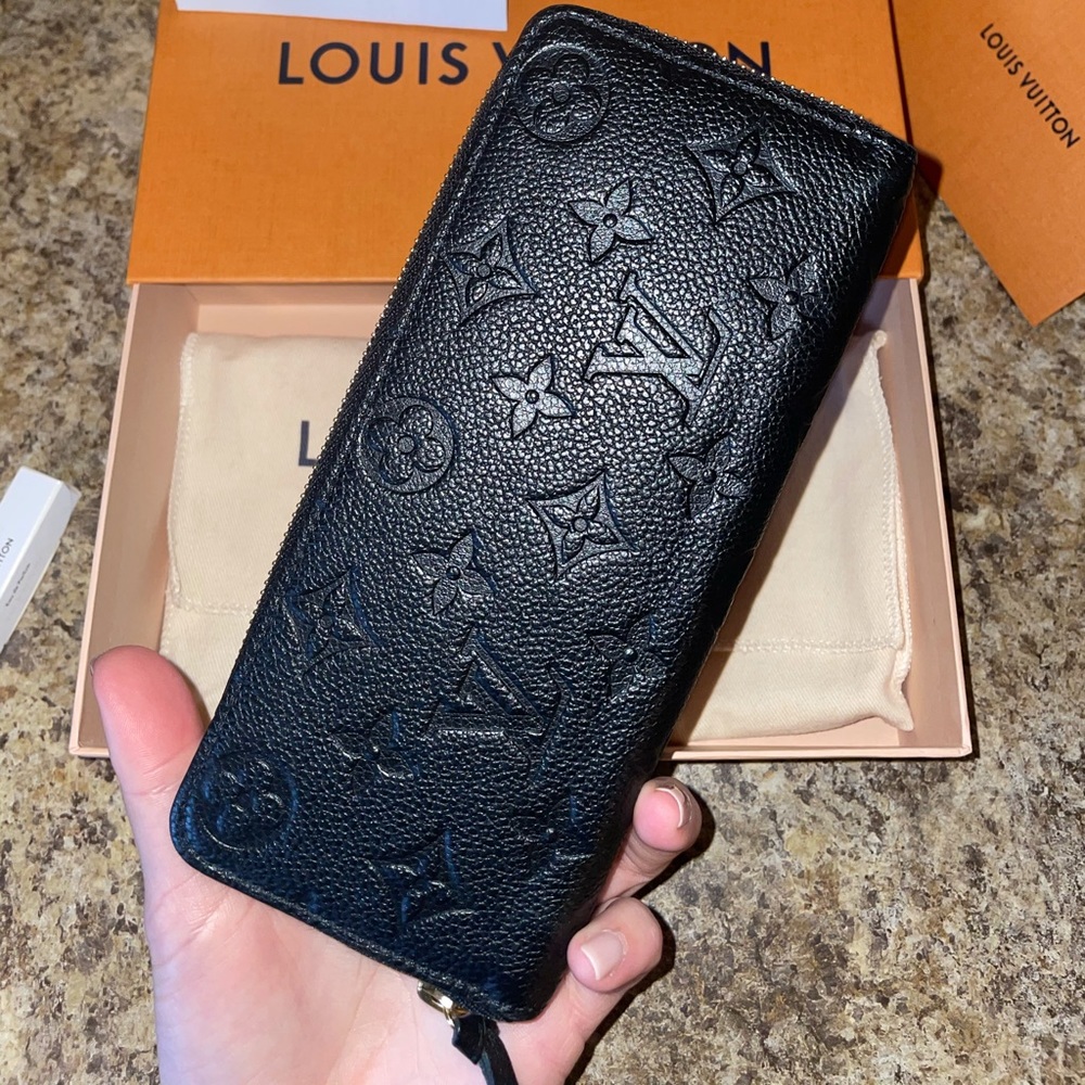 Authentic Louis Vuitton Clemence Wallet in Monogram Empreinte Leather.